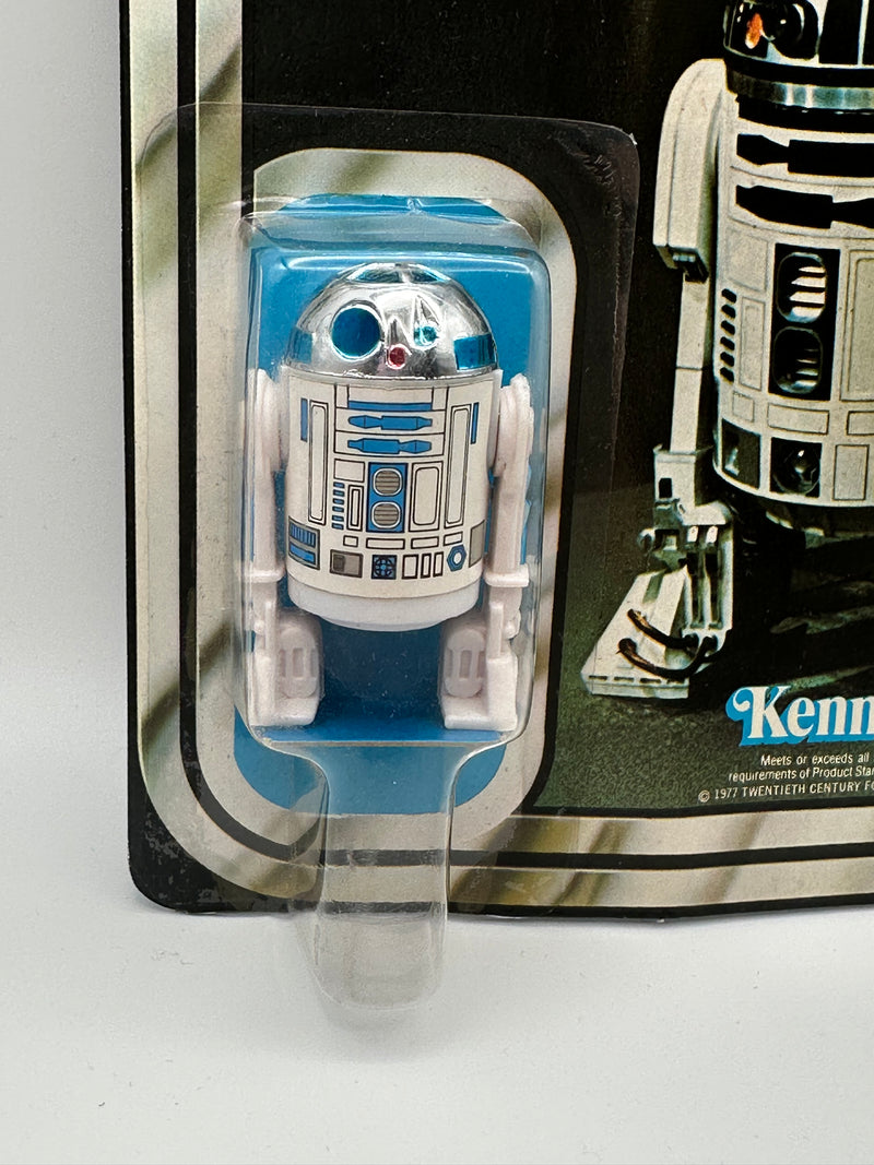 1977 Kenner Star Wars Artoo-Detoo R2-D2 12 Back-C vintage sealed action figure on original card with bright blue character artwork