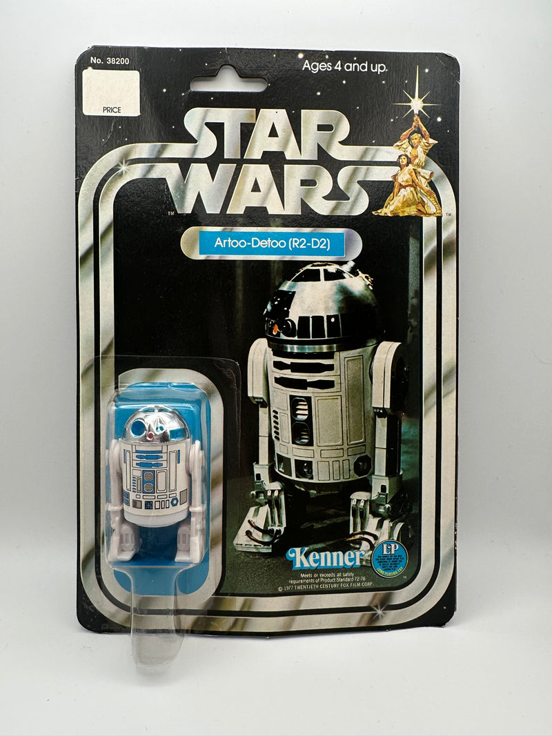 1977 Kenner Star Wars Artoo-Detoo R2-D2 12 Back-C vintage sealed action figure on original card with bright blue character artwork