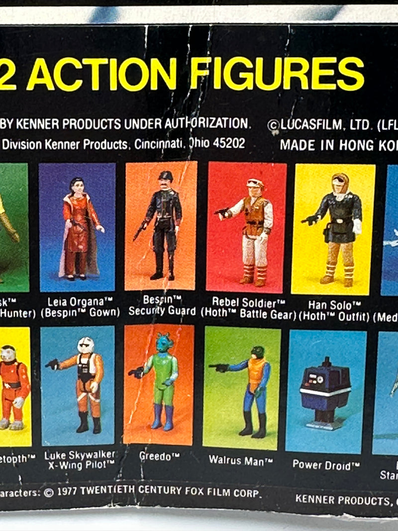 1977 Kenner Star Wars Artoo-Detoo R2-D2 12 Back-C vintage sealed action figure on original card with bright blue character artwork