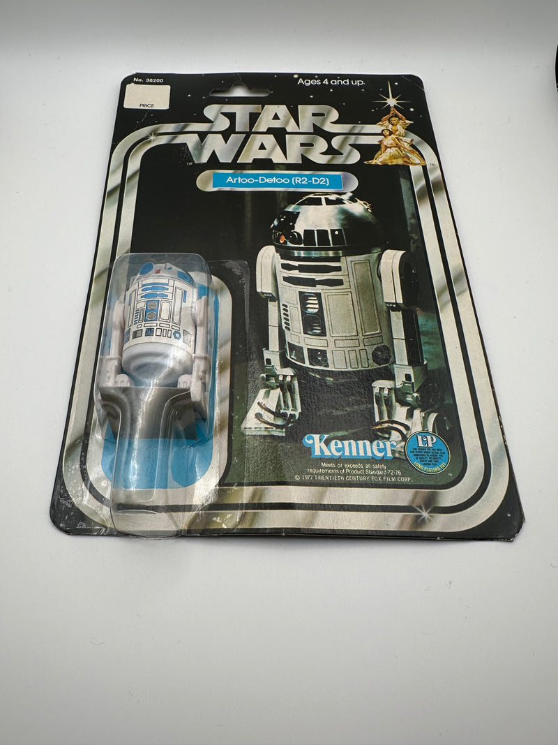 1977 Kenner Star Wars Artoo-Detoo R2-D2 12 Back-C vintage sealed action figure on original card with bright blue character artwork