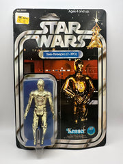 1977 Kenner Star Wars See-Threepio C-3PO 12 Back-C vintage sealed action figure on original card with bright gold figure and early Star Wars cardback