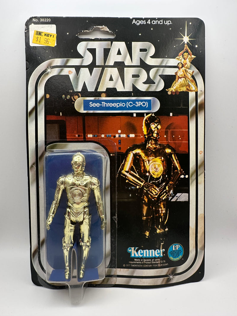 1977 Kenner Star Wars See-Threepio C-3PO 12 Back-C vintage sealed action figure on original card with bright gold figure and early Star Wars cardback