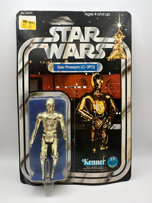 1977 Kenner Star Wars See-Threepio C-3PO 12 Back-C vintage sealed action figure on original card with bright gold figure and early Star Wars cardback