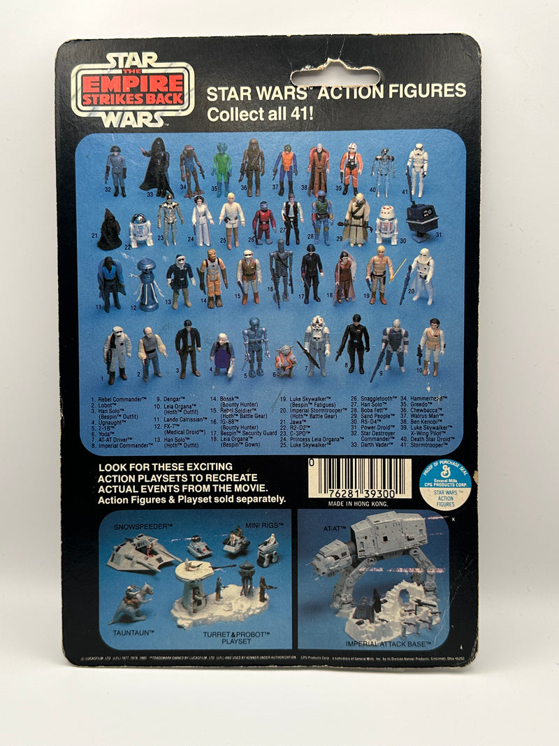 1980 Kenner Star Wars Imperial Commander 41 back MOC front view with clear bubble
1980 Kenner Imperial Commander figure close-up in sealed blister with blaster accessory
Vintage Star Wars ESB Imperial Commander punched card with wear and Toys R Us sticker
Star Wars Imperial Commander 41 back cardback Collect All 41 Made in Hong Kong
Imperial Commander bubble side view showing denting near top of blister