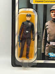 1980 Kenner Star Wars Imperial Commander 41 back MOC front view with clear bubble
1980 Kenner Imperial Commander figure close-up in sealed blister with blaster accessory
Vintage Star Wars ESB Imperial Commander punched card with wear and Toys R Us sticker
Star Wars Imperial Commander 41 back cardback Collect All 41 Made in Hong Kong
Imperial Commander bubble side view showing denting near top of blister