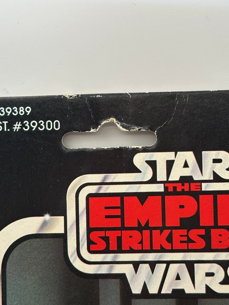 1980 Kenner Star Wars Imperial Commander 41 back MOC front view with clear bubble
1980 Kenner Imperial Commander figure close-up in sealed blister with blaster accessory
Vintage Star Wars ESB Imperial Commander punched card with wear and Toys R Us sticker
Star Wars Imperial Commander 41 back cardback Collect All 41 Made in Hong Kong
Imperial Commander bubble side view showing denting near top of blister