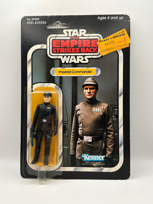 1980 Kenner Star Wars Imperial Commander 41 back MOC front view with clear bubble
1980 Kenner Imperial Commander figure close-up in sealed blister with blaster accessory
Vintage Star Wars ESB Imperial Commander punched card with wear and Toys R Us sticker
Star Wars Imperial Commander 41 back cardback Collect All 41 Made in Hong Kong
Imperial Commander bubble side view showing denting near top of blister