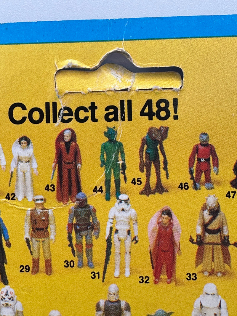 vintage 1982 kenner star wars 4 lom esb 48 back moc front view clear bubble
4 lom figure sealed bubble close up vintage kenner star wars esb
esb 48 back hanger area unpunched with wear around punch detail
vintage star wars revenge of the jedi anakin offer sticker close up
kenner 4 lom bubble side profile clear bubble sealed no lifting
vintage star wars card back collect all 48 4 lom figure