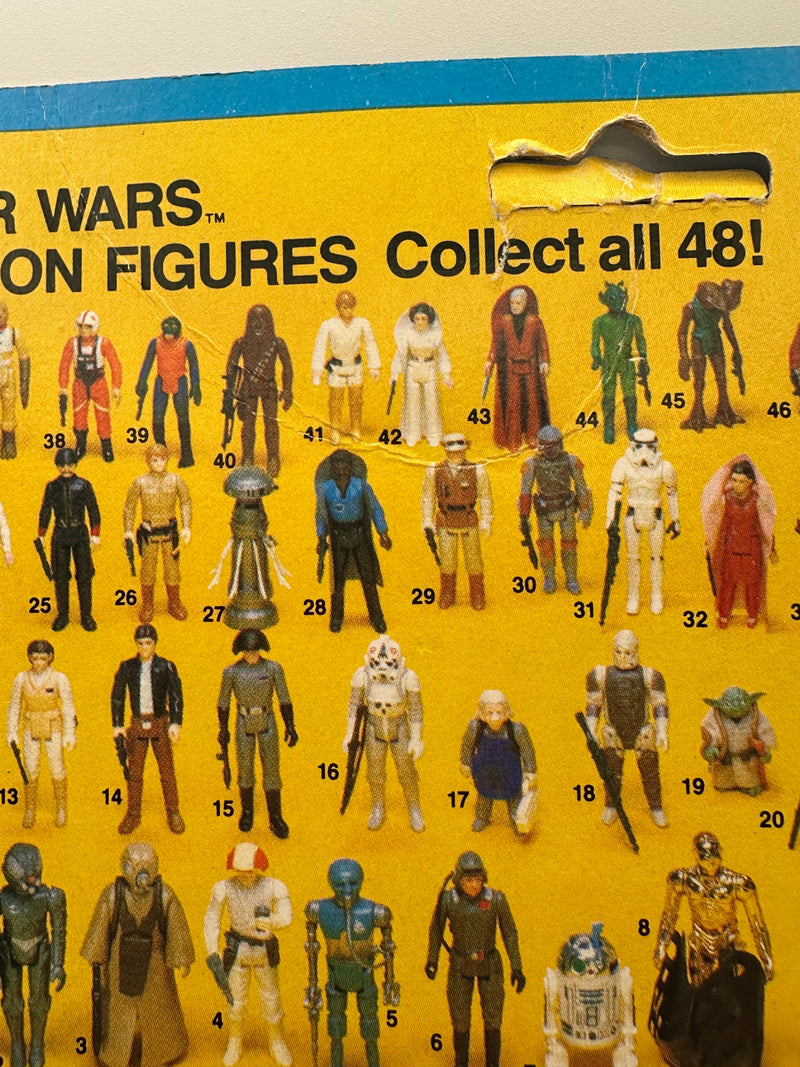 vintage 1982 kenner star wars 4 lom esb 48 back moc front view clear bubble
4 lom figure sealed bubble close up vintage kenner star wars esb
esb 48 back hanger area unpunched with wear around punch detail
vintage star wars revenge of the jedi anakin offer sticker close up
kenner 4 lom bubble side profile clear bubble sealed no lifting
vintage star wars card back collect all 48 4 lom figure