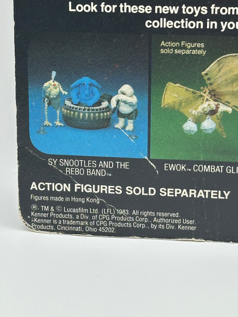 1983 Kenner Star Wars B-Wing Pilot MOC front view 77 back card
Vintage Star Wars B-Wing Pilot sealed figure bubble close-up
Return of the Jedi B-Wing Pilot cardback collect all 77 layout
Kenner B-Wing Pilot figure bubble clarity and yellowing detail
Star Wars B-Wing Pilot card edge wear and corner condition close-up
Vintage Kenner Star Wars cardback figure lineup detail 77 back
B-Wing Pilot punch hole condition close-up vintage Kenner
1983 Kenner B-Wing Pilot packaging back barcode and proof of purchase sea
