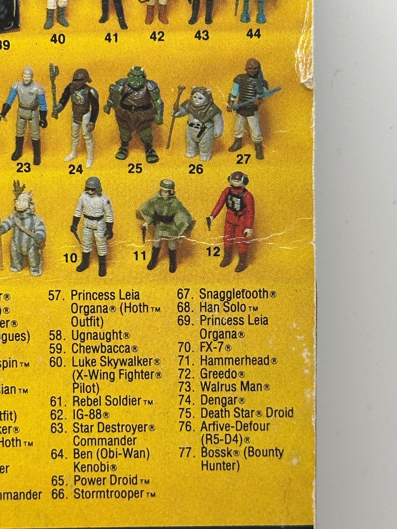 1983 Kenner Star Wars B-Wing Pilot MOC front view 77 back card
Vintage Star Wars B-Wing Pilot sealed figure bubble close-up
Return of the Jedi B-Wing Pilot cardback collect all 77 layout
Kenner B-Wing Pilot figure bubble clarity and yellowing detail
Star Wars B-Wing Pilot card edge wear and corner condition close-up
Vintage Kenner Star Wars cardback figure lineup detail 77 back
B-Wing Pilot punch hole condition close-up vintage Kenner
1983 Kenner B-Wing Pilot packaging back barcode and proof of purchase sea