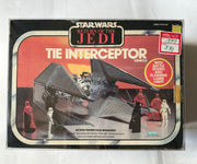 Vintage 1983 Kenner Star Wars Return of the Jedi TIE Interceptor vehicle complete in original box with battle sound and flashing laser light packaging