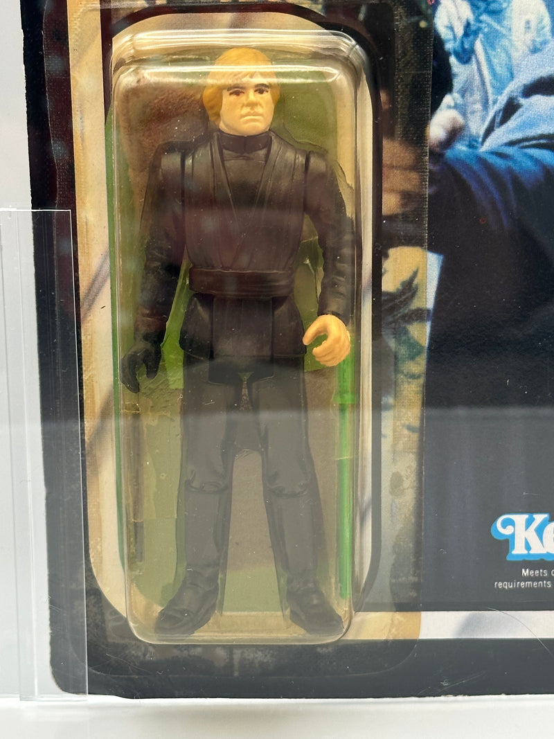 1983 Kenner Star Wars Luke Skywalker Jedi Knight Outfit ROTJ 77 Back AFA 70 graded unpunched figure with 80 bubble and 90 figure subgrades