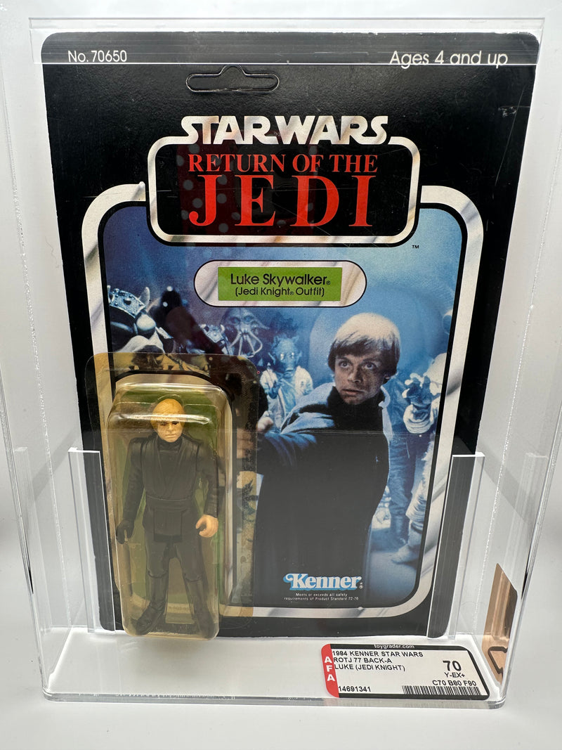 1983 Kenner Star Wars Luke Skywalker Jedi Knight Outfit ROTJ 77 Back AFA 70 graded unpunched figure with 80 bubble and 90 figure subgrades