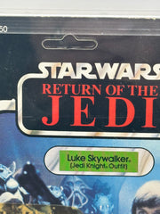 1983 Kenner Star Wars Luke Skywalker Jedi Knight Outfit ROTJ 77 Back AFA 70 graded unpunched figure with 80 bubble and 90 figure subgrades