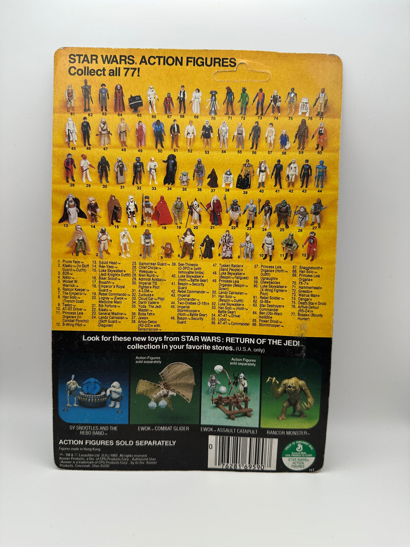1983 Kenner Star Wars Weequay ROTJ 77 back MOC unpunched front view
Weequay ROTJ Kenner vintage figure yellow bubble close-up
Unpunched hang tab detail Weequay 77 back card
Side profile bubble dent Weequay ROTJ figure
Angled view Kenner Star Wars Weequay MOC carded figure
Collect All 77 back detail Weequay ROTJ Kenner card
