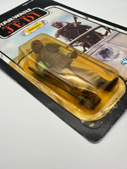 1983 Kenner Star Wars Weequay ROTJ 77 back MOC unpunched front view
Weequay ROTJ Kenner vintage figure yellow bubble close-up
Unpunched hang tab detail Weequay 77 back card
Side profile bubble dent Weequay ROTJ figure
Angled view Kenner Star Wars Weequay MOC carded figure
Collect All 77 back detail Weequay ROTJ Kenner card
