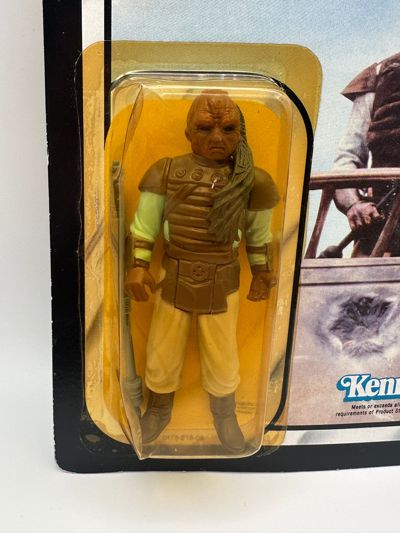 1983 Kenner Star Wars Weequay ROTJ 77 back MOC unpunched front view
Weequay ROTJ Kenner vintage figure yellow bubble close-up
Unpunched hang tab detail Weequay 77 back card
Side profile bubble dent Weequay ROTJ figure
Angled view Kenner Star Wars Weequay MOC carded figure
Collect All 77 back detail Weequay ROTJ Kenner card
