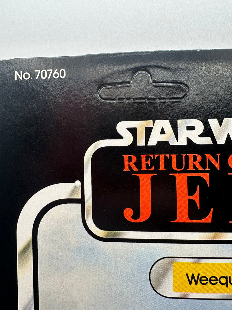 1983 Kenner Star Wars Weequay ROTJ 77 back MOC unpunched front view
Weequay ROTJ Kenner vintage figure yellow bubble close-up
Unpunched hang tab detail Weequay 77 back card
Side profile bubble dent Weequay ROTJ figure
Angled view Kenner Star Wars Weequay MOC carded figure
Collect All 77 back detail Weequay ROTJ Kenner card
