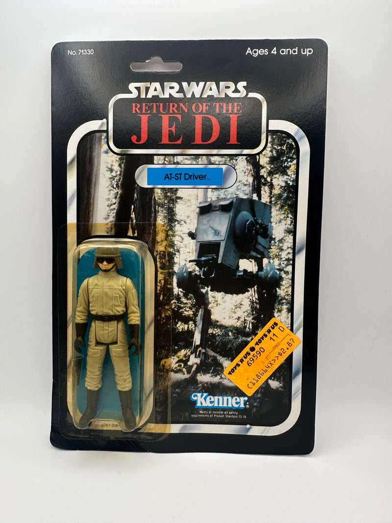 1983 Kenner Star Wars Return of the Jedi AT-ST Driver 77 Back factory sealed MOC action figure with original Toys R Us price sticker