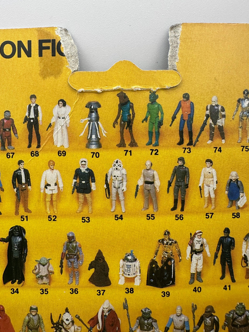 1983 Kenner Star Wars Return of the Jedi Han Solo Trench Coat 77 Back factory sealed MOC action figure with original camouflage trench coat and blaster accessory