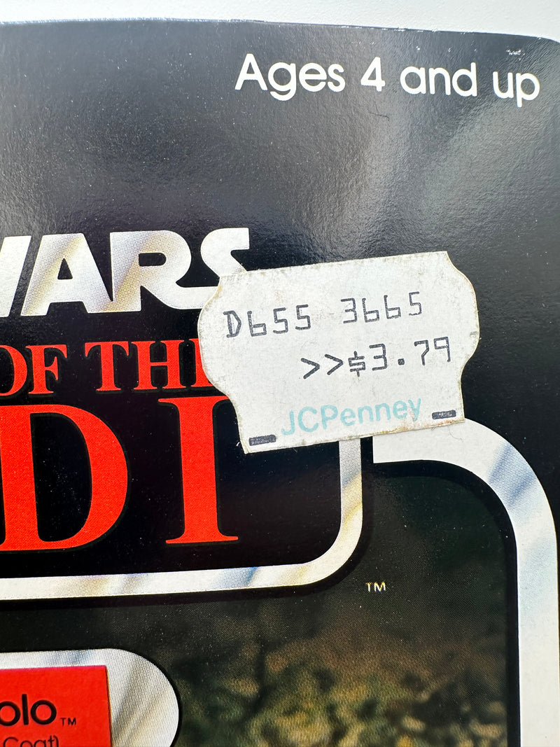 1983 Kenner Star Wars Return of the Jedi Han Solo Trench Coat 77 Back factory sealed MOC action figure with original camouflage trench coat and blaster accessory