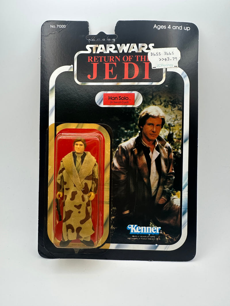 1983 Kenner Star Wars Return of the Jedi Han Solo Trench Coat 77 Back factory sealed MOC action figure with original camouflage trench coat and blaster accessory