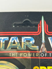 1984 Kenner Star Wars Romba action figure with collector coin.