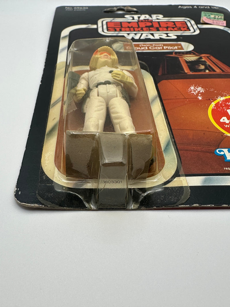 vintage 1982 kenner star wars cloud car pilot 47 back moc front view
twin pod cloud car pilot sealed bubble close up vintage kenner
esb 47 back card hanger area wear around punch detail
vintage star wars card 4 lom offer sticker close up
kenner cloud car pilot bubble side profile yellowing
vintage star wars card back collect all 47 cloud car pilot
