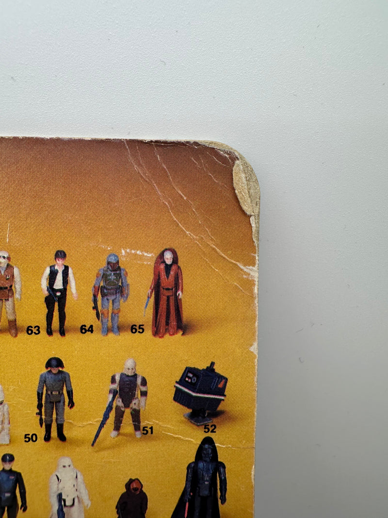 Vintage 1983 Kenner Star Wars Admiral Ackbar Return of the Jedi 65 back MOC sealed action figure with coin offer, yellowed bubble with visible crack, unpunched card with hanger wear, front view collectible
