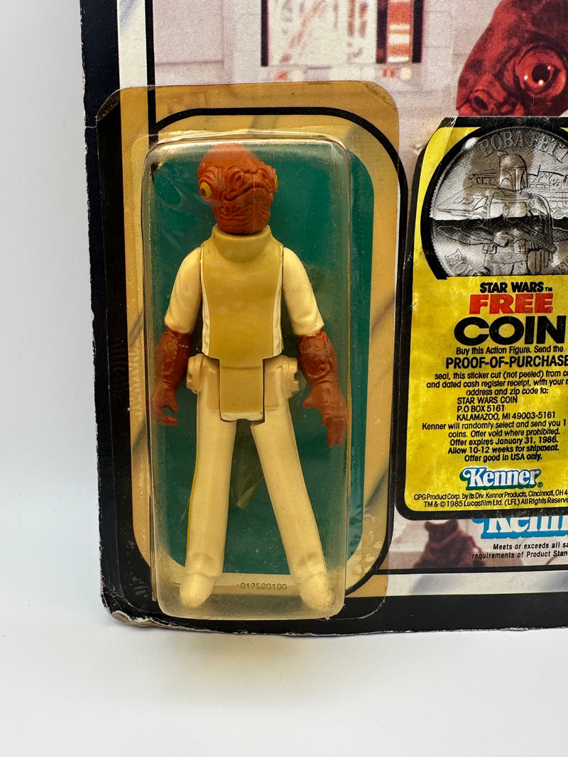 Vintage 1983 Kenner Star Wars Admiral Ackbar Return of the Jedi 65 back MOC sealed action figure with coin offer, yellowed bubble with visible crack, unpunched card with hanger wear, front view collectible
