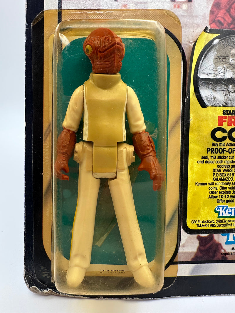 Vintage 1983 Kenner Star Wars Admiral Ackbar Return of the Jedi 65 back MOC sealed action figure with coin offer, yellowed bubble with visible crack, unpunched card with hanger wear, front view collectible