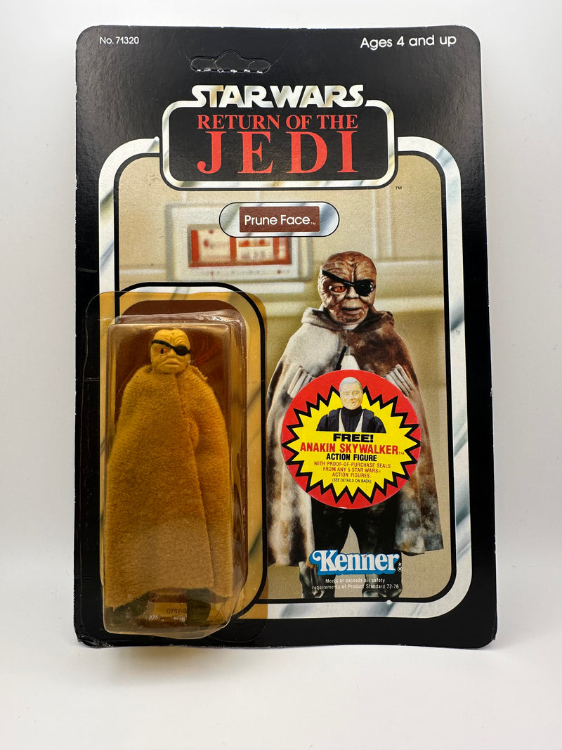 vintage 1984 kenner star wars prune face 77 back moc front view
prune face figure sealed bubble close up vintage kenner
rotj 77 back hanger area wear around punch detail
vintage star wars anakin offer sticker close up
kenner prune face bubble side profile yellowing warping
vintage star wars card back collect all 77 prune face