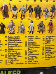 vintage 1984 kenner star wars prune face 77 back moc front view
prune face figure sealed bubble close up vintage kenner
rotj 77 back hanger area wear around punch detail
vintage star wars anakin offer sticker close up
kenner prune face bubble side profile yellowing warping
vintage star wars card back collect all 77 prune face