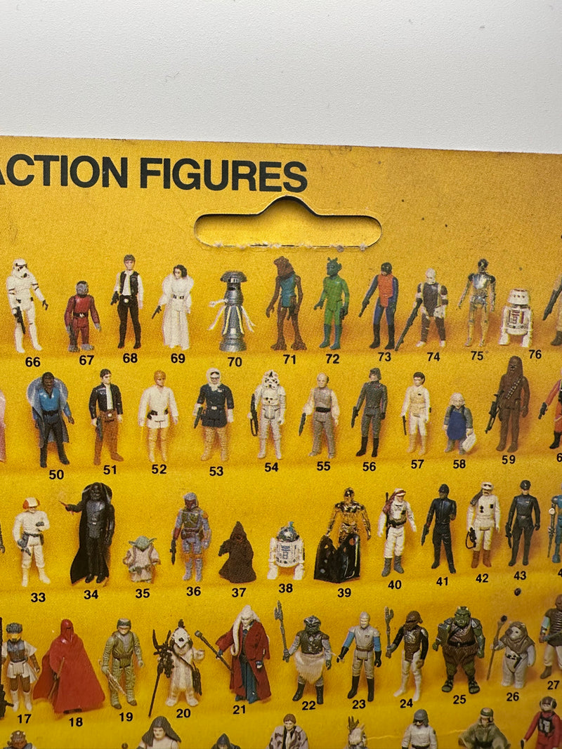 Han Solo Trench Coat ROTJ 77 back unpunched MOC with Anakin sticker front view
Close-up Han Solo figure sealed in original Kenner bubble
Anakin Skywalker offer sticker detail May 30 1985
ROTJ 77 back Collect All 77 lineup
Side profile showing amber bubble tone
Unpunched hanger detail with light stress
Full front Han Solo trench coat MOC
Back of card Kenner checklist