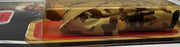 Han Solo Trench Coat ROTJ 77 back unpunched MOC with Anakin sticker front view
Close-up Han Solo figure sealed in original Kenner bubble
Anakin Skywalker offer sticker detail May 30 1985
ROTJ 77 back Collect All 77 lineup
Side profile showing amber bubble tone
Unpunched hanger detail with light stress
Full front Han Solo trench coat MOC
Back of card Kenner checklist