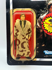 Han Solo Trench Coat ROTJ 77 back unpunched MOC with Anakin sticker front view
Close-up Han Solo figure sealed in original Kenner bubble
Anakin Skywalker offer sticker detail May 30 1985
ROTJ 77 back Collect All 77 lineup
Side profile showing amber bubble tone
Unpunched hanger detail with light stress
Full front Han Solo trench coat MOC
Back of card Kenner checklist